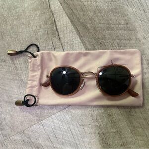 Round sunglasses with mauve metal rim